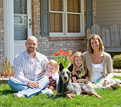 Family In Front Of House Family In Front Of House